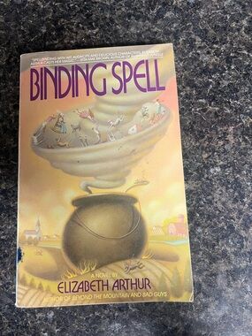 Softcover Novel with Yellow Cover Art